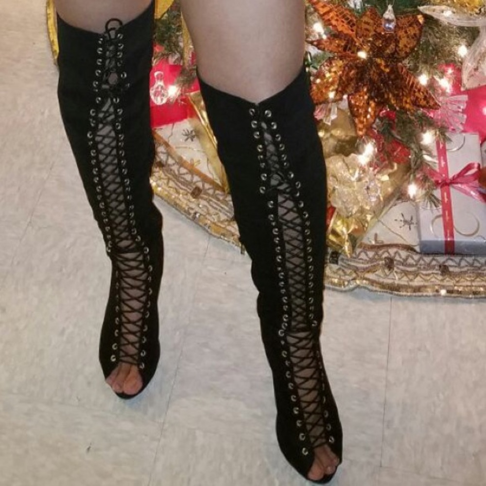 High knee laced in front boots